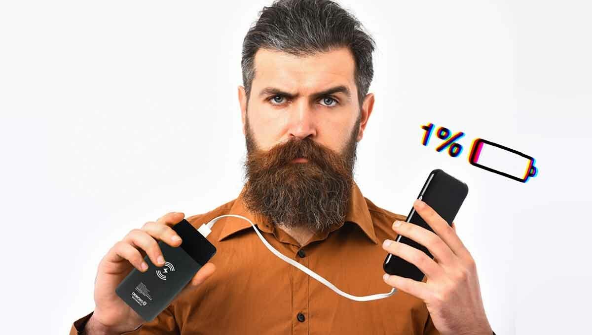 bearded man with wireless power bank charger